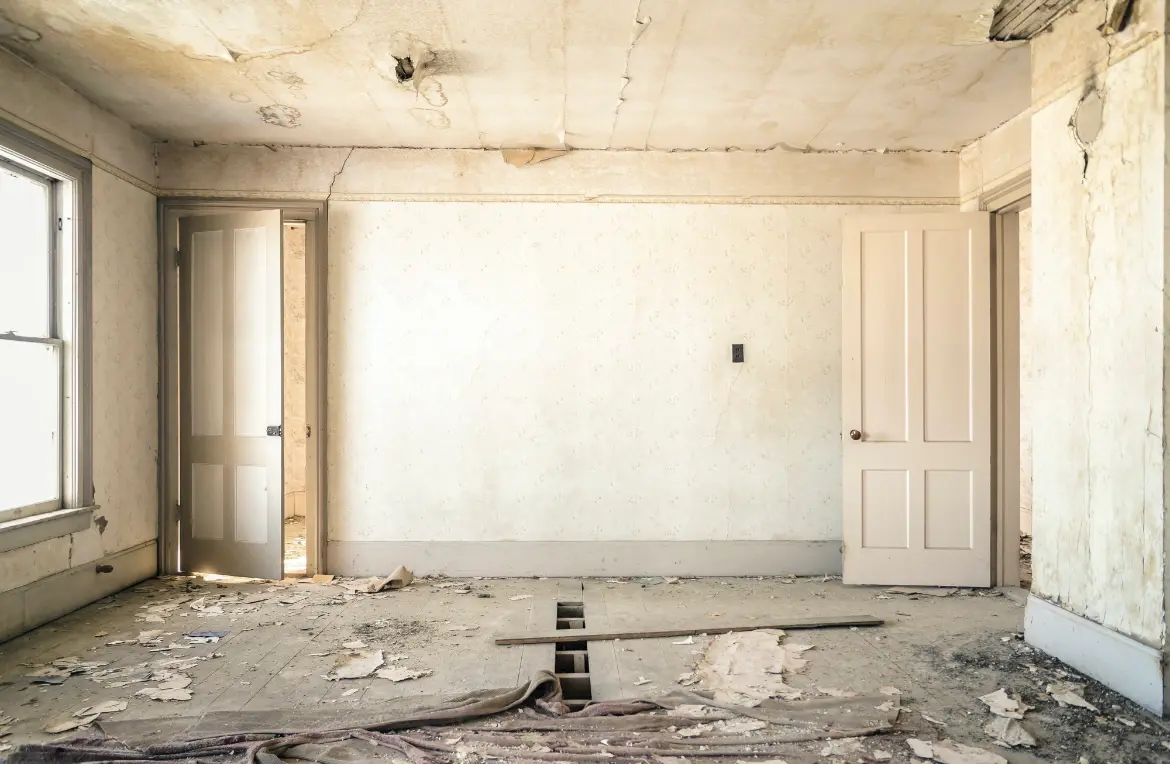 Waste disposal crew managing a cleanout project in North Muskegon